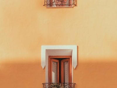 a building with two balconies and a balcony